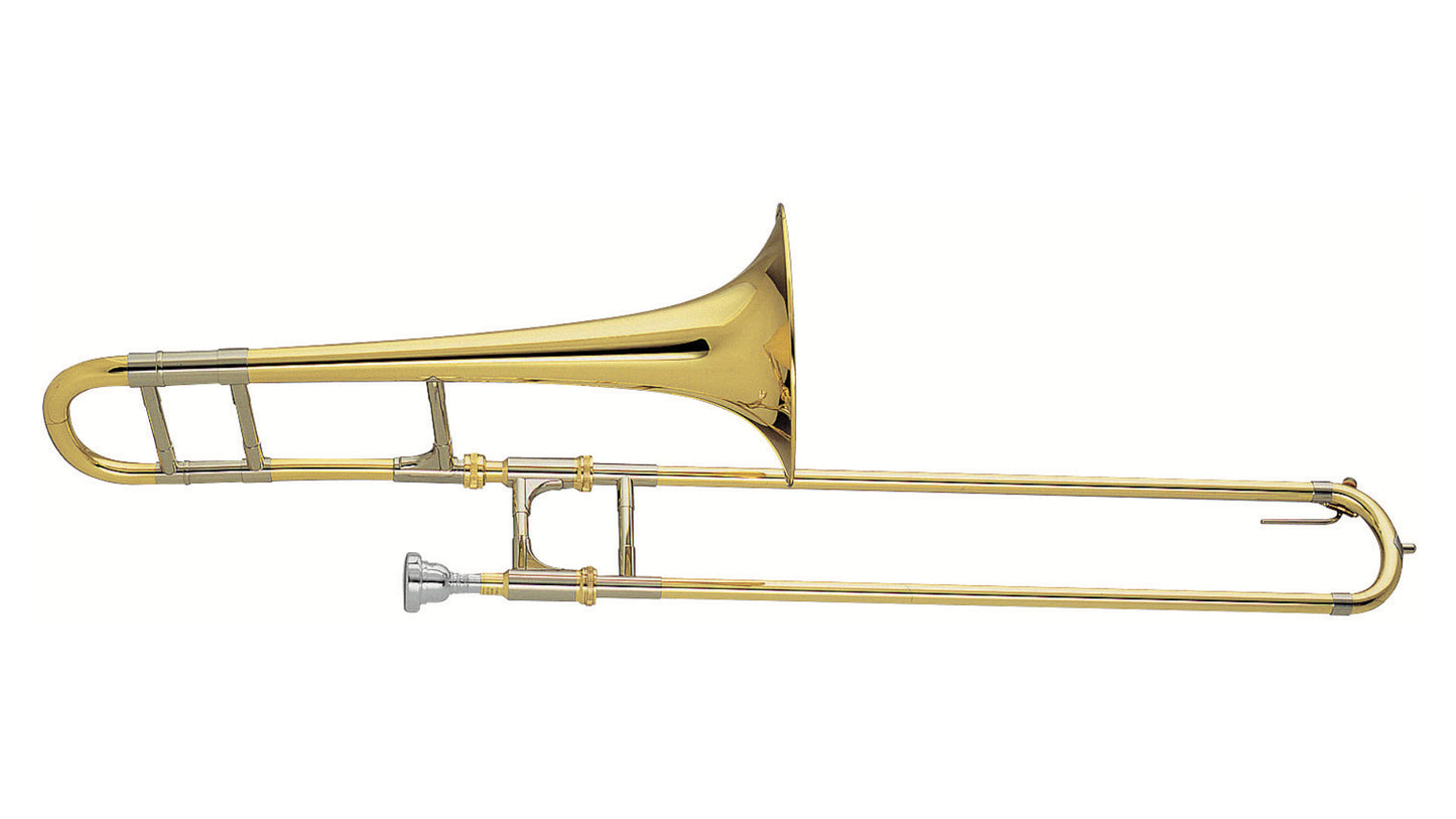 Gold trombone on a white background